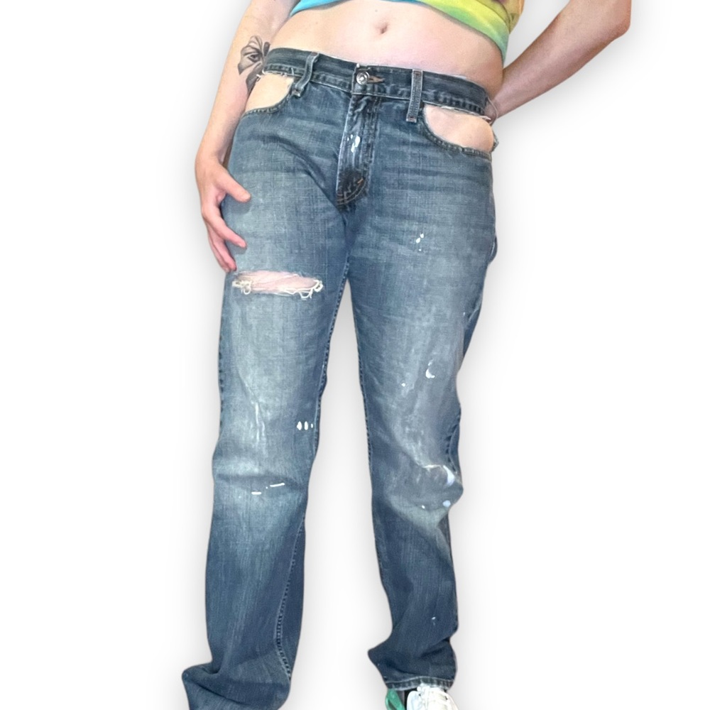 Levi’s Cutout Distressed Straight Slim Jeans